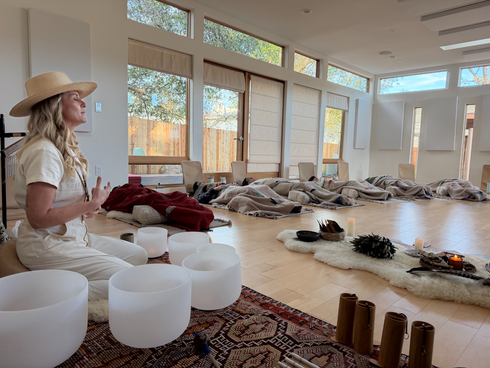 Kali May guiding a Ritual Breathwork group in the studio
