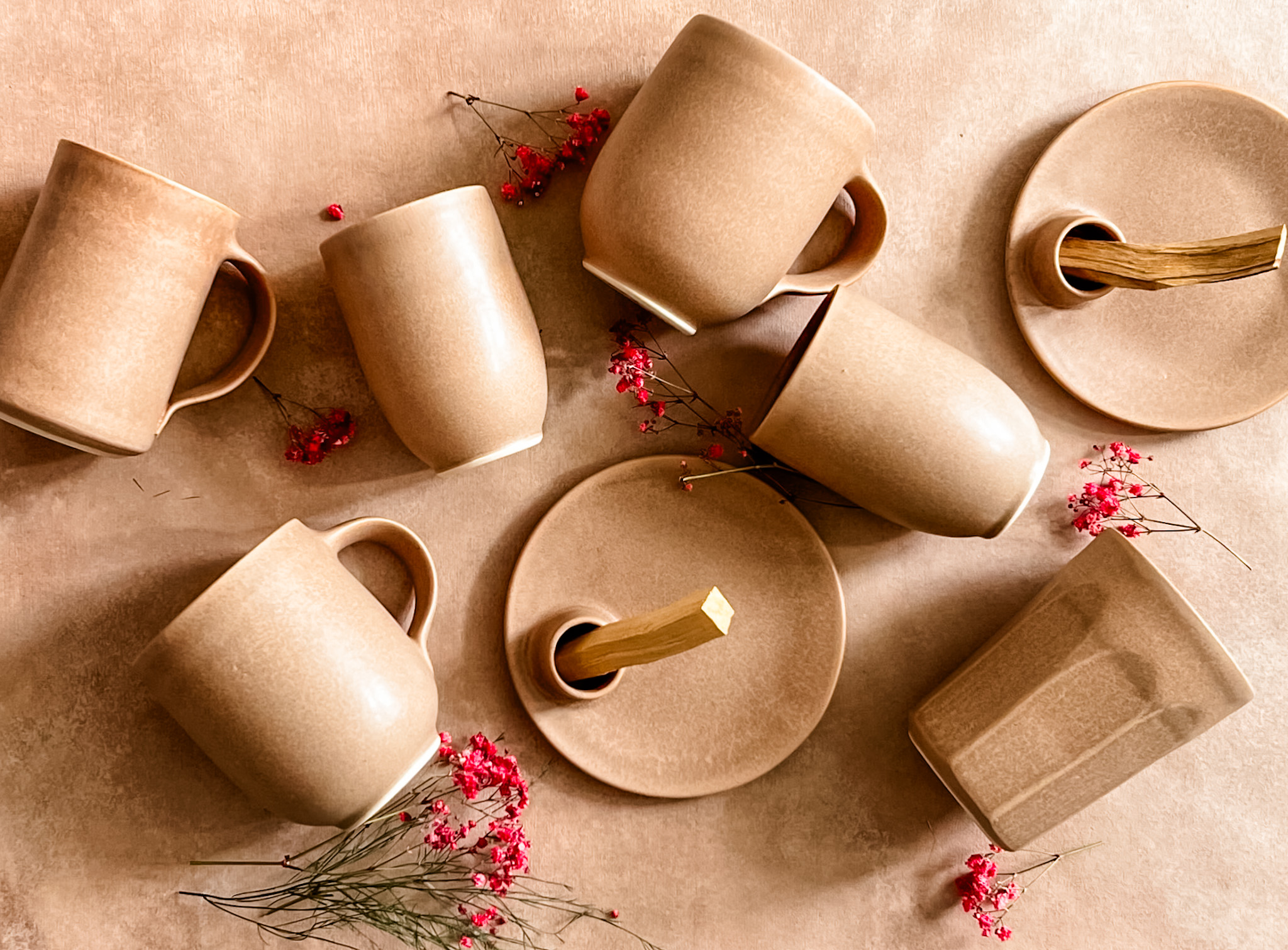 Warm taupe handmade mugs, tumblers, incense plates, and serving pieces from the Sespe Collection