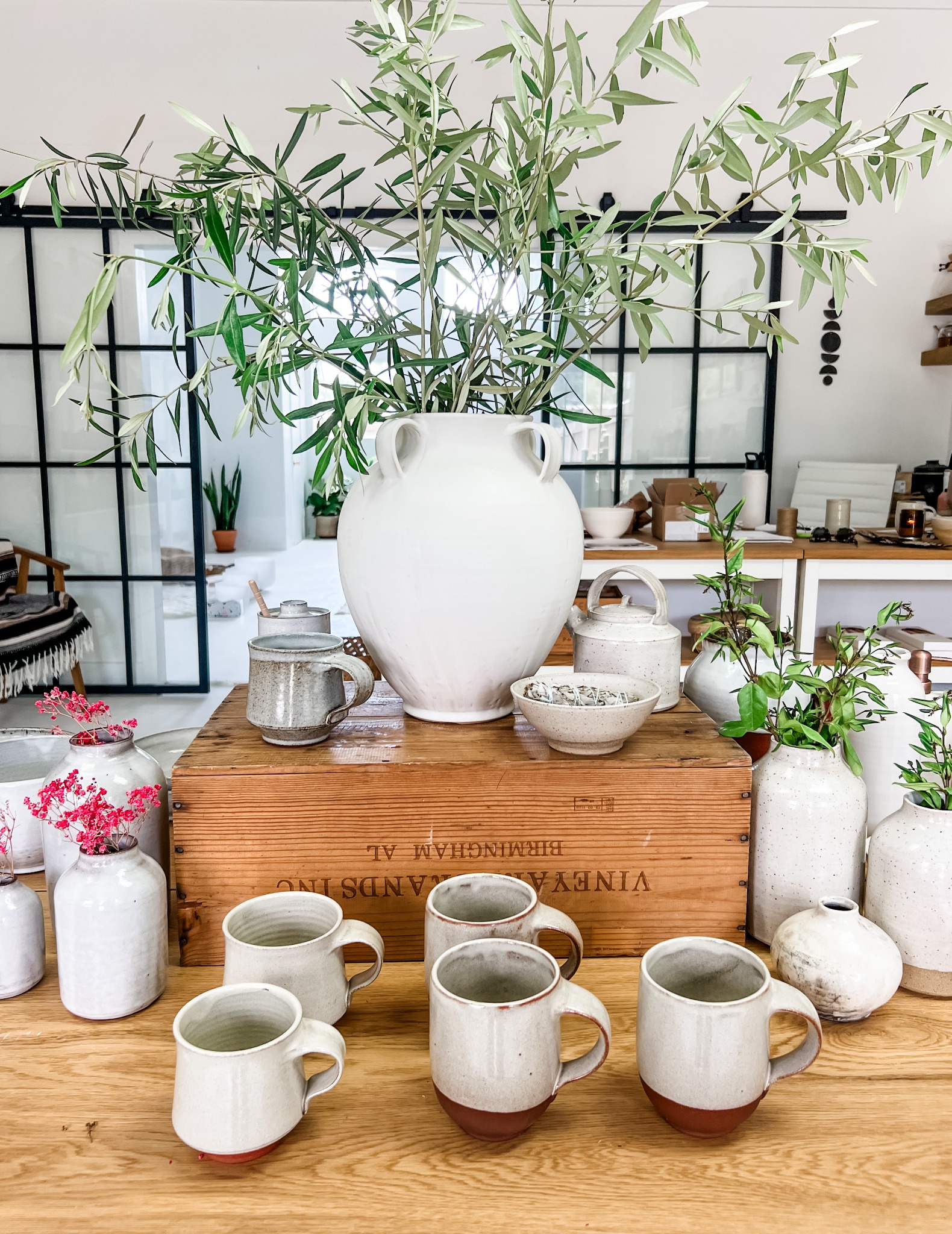 A collection of handmade Ritual Ceramics arranged in the Ojai studio